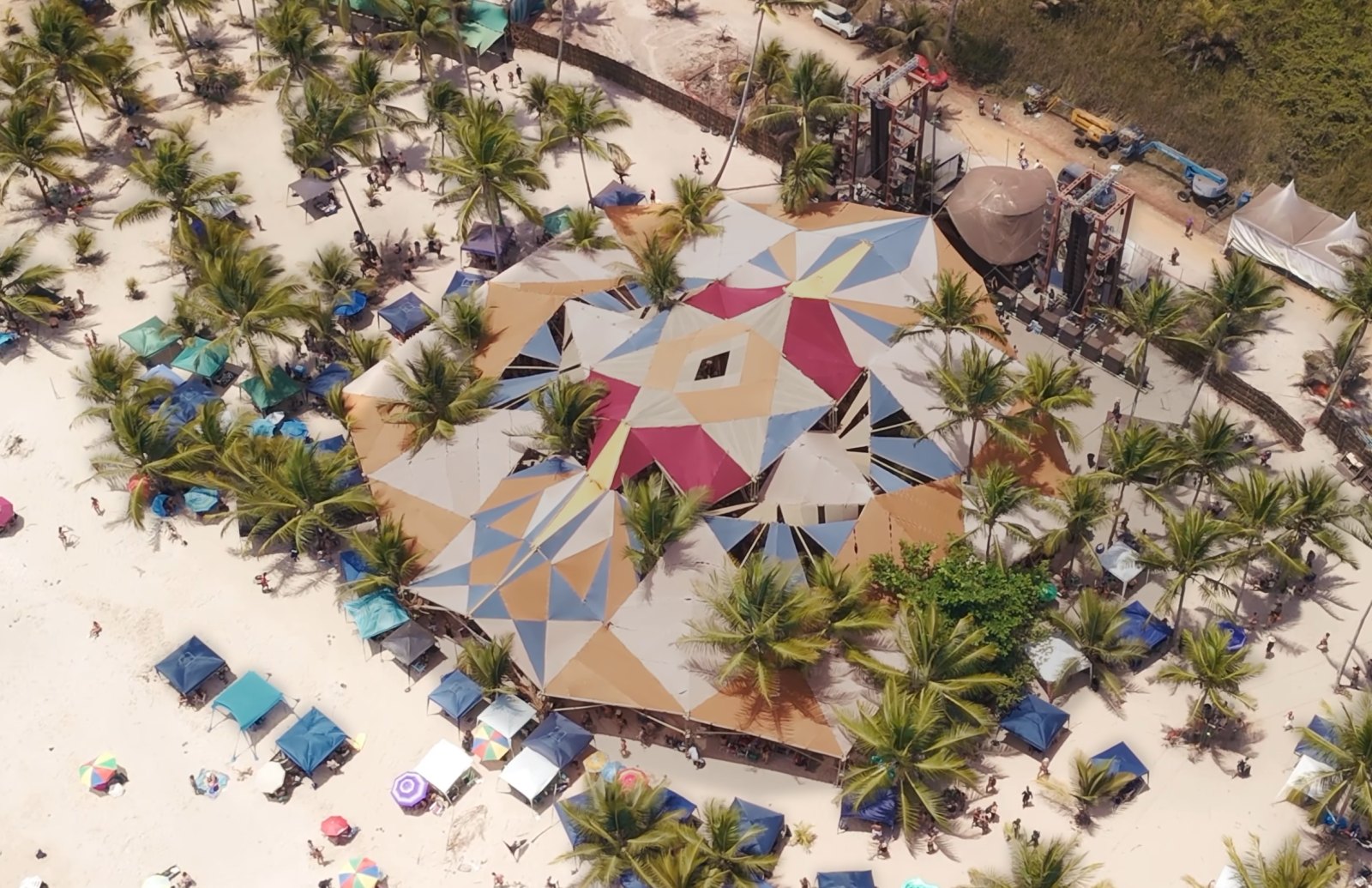 Aerial view of the Mainfloor site: sand, dome, stage towers and palm grove
